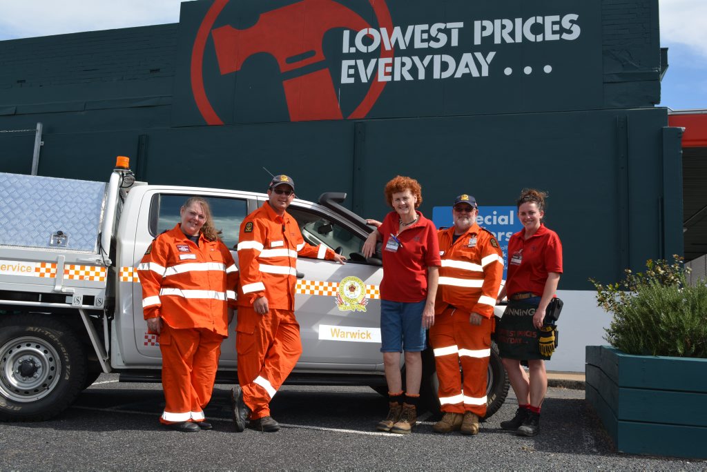 Donna Turnley, Brad O'Neil, Helen McDonald, John Newley and Debby Stevens discuss plans for the Bunnings Aussie Barbecue fundraiser for the Warwick SES. 